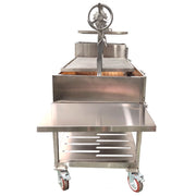 Tagwood BBQ XL Freestanding Argentine Santa Maria grill in stainless steel with height-adjustable grates and a peaked roof for outdoor cooking.