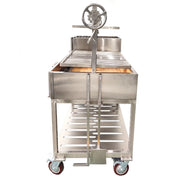 Tagwood BBQ XL Freestanding Argentine Santa Maria grill in stainless steel with height-adjustable grates and caster wheels for outdoor cooking.