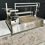 Tagwood BBQ XL Built-In Santa Maria Argentine wood fire grill with stainless steel, hooks, adjustable grates, and brasero firebox.