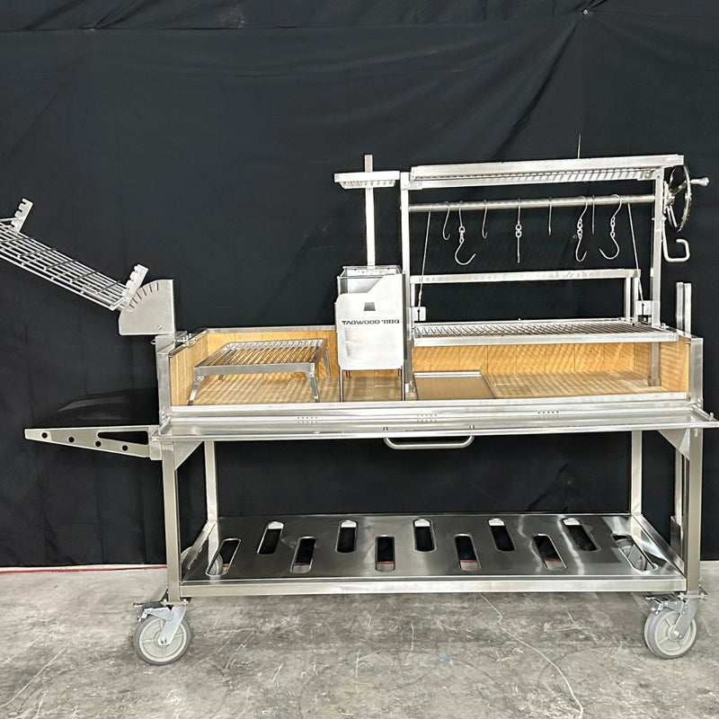 Tagwood BBQ XL Freestanding Argentine Santa Maria Grill with 304 stainless steel, adjustable grates, gaucho brasero, and wheels.