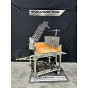 Tagwood BBQ Freestanding Argentine Charcoal Gaucho Grill BBQ33SS with stainless steel clamp grill, firebox, and adjustable grates on casters.