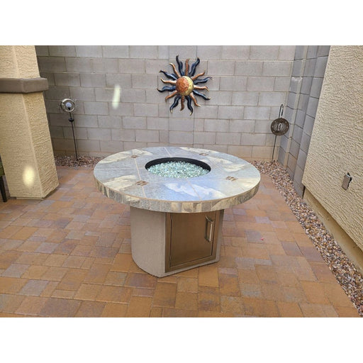 Kokomo Grills Bahama Outdoor Fire Table with 4’ stone top, stainless steel door, and glass fire pit center for patio warmth and style