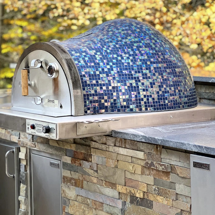 HPC Fire Inspired Villa Series built-in brick oven with stainless steel flange and blue glass tiled dome for outdoor kitchens.