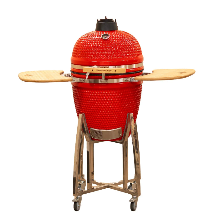 Red ceramic grill with wooden accents on a white background