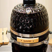 Black barbecue grill with 'ComfortBilt' branding on a neutral background