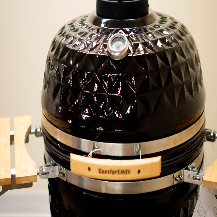 Black barbecue grill with 'ComfortBilt' branding on a neutral background