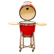 Red ceramic barbecue grill with wooden accents on a white background