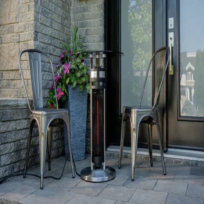 Outdoor patio scene with two chairs, a heater, and a potted plant on a stone patio.