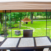 Outdoor patio set with table and chairs under a wooden pergola, surrounded by greenery.