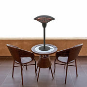 Outdoor patio heater with a round table and two wicker chairs on a tiled floor.