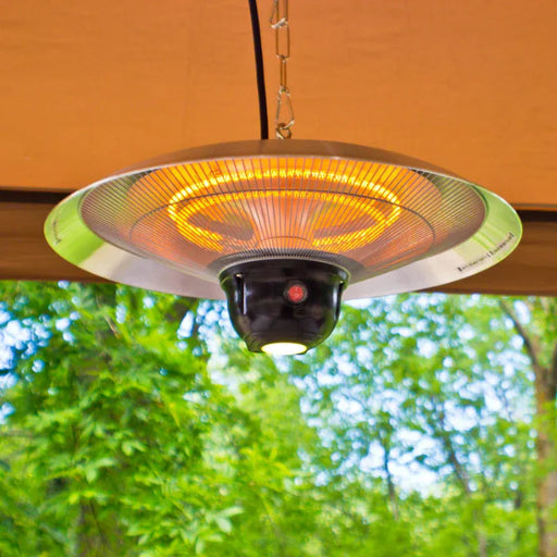 Outdoor patio heater hanging from a ceiling with trees in the background