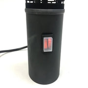 Black cylindrical device with a power switch on a white background
