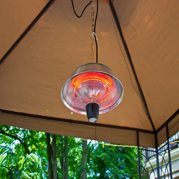 Outdoor patio heater hanging from a canopy with trees in the background
