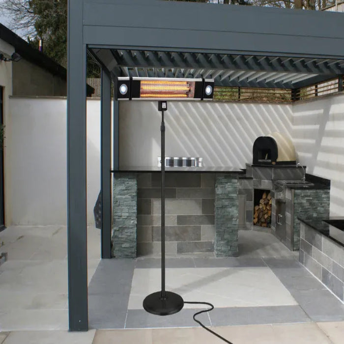 Modern outdoor kitchen with grill, oven, and stone accents