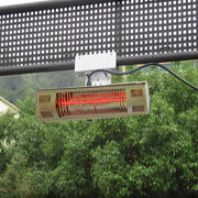 Infrared patio heater mounted on a metal railing with trees in the background