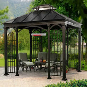 Black metal gazebo with patio furniture and a heater in a garden setting