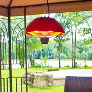 Red outdoor heater hanging from a gazebo with a scenic background of trees and water.