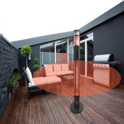Outdoor patio scene with a heater, sofa, and grill on a wooden deck.
